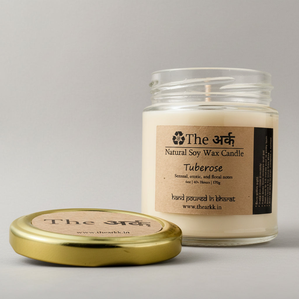 Jar of candle with lid on a beige background